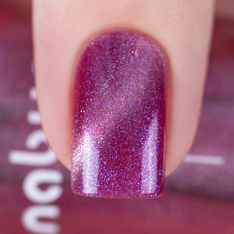 Nabyo Nail Polish- Charlotte A purple jelly nail polish with red-pink shimmer and silver magnetic Nail Polish 
I Love My Polish