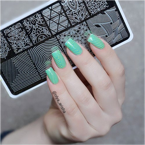 I've been looking into nail stamping and I'm a little confused. How do  people get the layered outline look with different colors? Does anyone know  of a good tutorial video that explains